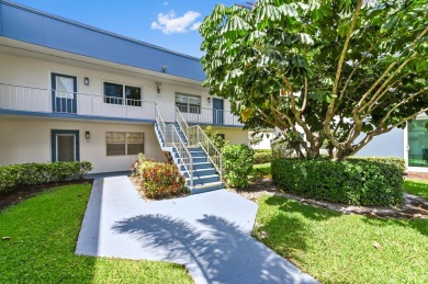 Enjoy breathtaking golf course and water views from this on Kings Point Golf -Flanders Way in Florida - for sale on GolfHomes.com, golf home, golf lot