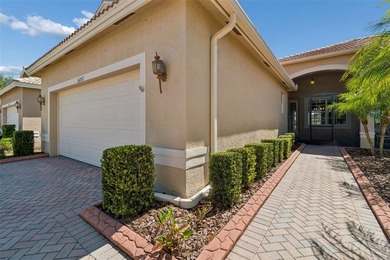 This lovely home is located just steps away from the Valencia on Caloosa Greens Executive Golf Course in Florida - for sale on GolfHomes.com, golf home, golf lot