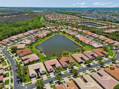 This lovely home is located just steps away from the Valencia on Caloosa Greens Executive Golf Course in Florida - for sale on GolfHomes.com, golf home, golf lot