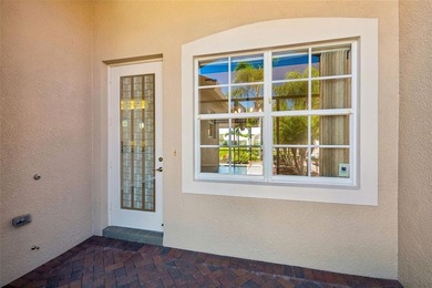 This lovely home is located just steps away from the Valencia on Caloosa Greens Executive Golf Course in Florida - for sale on GolfHomes.com, golf home, golf lot