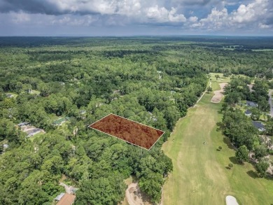 BEAUTFUL WOODED LOT ON THE FAIRWAY OF THE SANDS OF WAKULLA on Wildwood Country Club in Florida - for sale on GolfHomes.com, golf home, golf lot