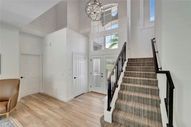 Coventry Island stunner! This 3BR/3BA home with a 3-car on  in Florida - for sale on GolfHomes.com, golf home, golf lot