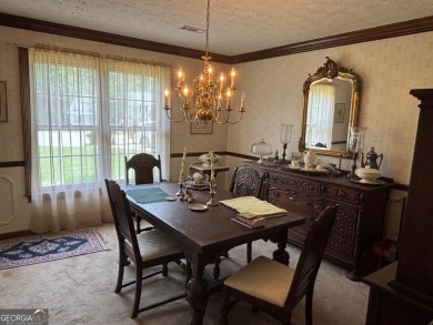 Peachtree City 4BR/2.5 BA Brick front home sits lovely on this on Braelinn Golf Club in Georgia - for sale on GolfHomes.com, golf home, golf lot