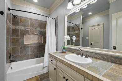 Exceptional custom-designed home with a stunning stone and brick on Sky Creek Ranch Golf Club in Texas - for sale on GolfHomes.com, golf home, golf lot