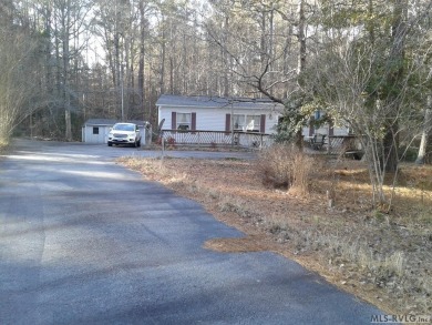 Cozy Doublewide Home with 3 bedrooms, 2 bathrooms. Split floor on Tanglewood Shores Golf Club in Virginia - for sale on GolfHomes.com, golf home, golf lot