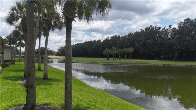 Come cozy up in this charming condo boasting picturesque lake on Vista Plantation Golf Club in Florida - for sale on GolfHomes.com, golf home, golf lot