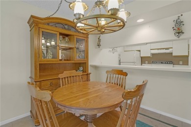 Come cozy up in this charming condo boasting picturesque lake on Vista Plantation Golf Club in Florida - for sale on GolfHomes.com, golf home, golf lot