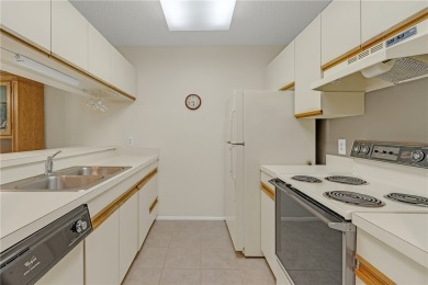 Come cozy up in this charming condo boasting picturesque lake on Vista Plantation Golf Club in Florida - for sale on GolfHomes.com, golf home, golf lot