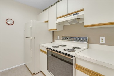 Come cozy up in this charming condo boasting picturesque lake on Vista Plantation Golf Club in Florida - for sale on GolfHomes.com, golf home, golf lot
