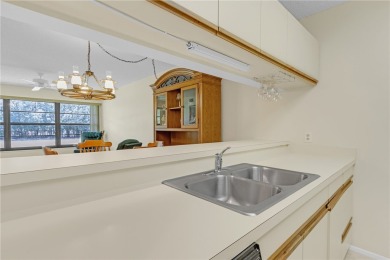 Come cozy up in this charming condo boasting picturesque lake on Vista Plantation Golf Club in Florida - for sale on GolfHomes.com, golf home, golf lot
