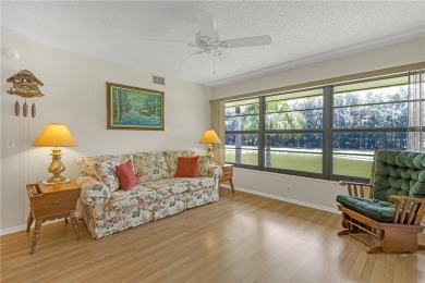Come cozy up in this charming condo boasting picturesque lake on Vista Plantation Golf Club in Florida - for sale on GolfHomes.com, golf home, golf lot