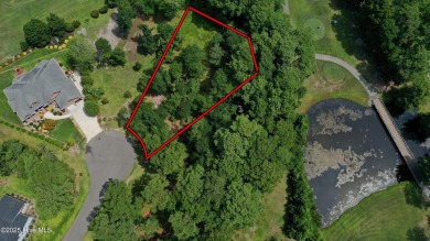 Build your dream home on this spacious lot overlooking the lush on Lockwood Folly Country Club in North Carolina - for sale on GolfHomes.com, golf home, golf lot