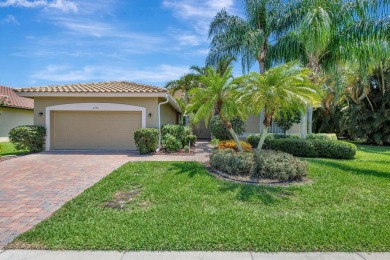 This unique lake-lateral home offers serene water views from the on Aberdeen Golf and Country Club in Florida - for sale on GolfHomes.com, golf home, golf lot