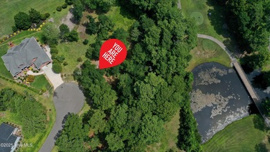 Build your dream home on this spacious lot overlooking the lush on Lockwood Folly Country Club in North Carolina - for sale on GolfHomes.com, golf home, golf lot