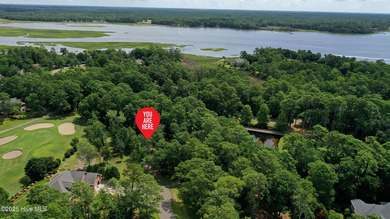 Build your dream home on this spacious lot overlooking the lush on Lockwood Folly Country Club in North Carolina - for sale on GolfHomes.com, golf home, golf lot