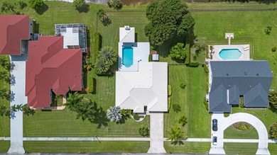 Stunning pool home with spectacular views. One of the most on The Wanderers Club in Florida - for sale on GolfHomes.com, golf home, golf lot