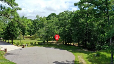 Build your dream home on this spacious lot overlooking the lush on Lockwood Folly Country Club in North Carolina - for sale on GolfHomes.com, golf home, golf lot