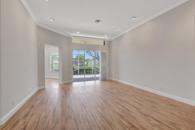 This unique lake-lateral home offers serene water views from the on Aberdeen Golf and Country Club in Florida - for sale on GolfHomes.com, golf home, golf lot