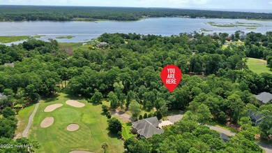 Build your dream home on this spacious lot overlooking the lush on Lockwood Folly Country Club in North Carolina - for sale on GolfHomes.com, golf home, golf lot