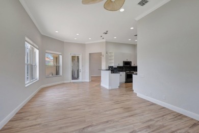 This unique lake-lateral home offers serene water views from the on Aberdeen Golf and Country Club in Florida - for sale on GolfHomes.com, golf home, golf lot