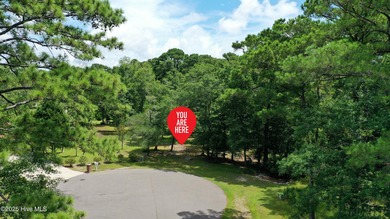 Build your dream home on this spacious lot overlooking the lush on Lockwood Folly Country Club in North Carolina - for sale on GolfHomes.com, golf home, golf lot