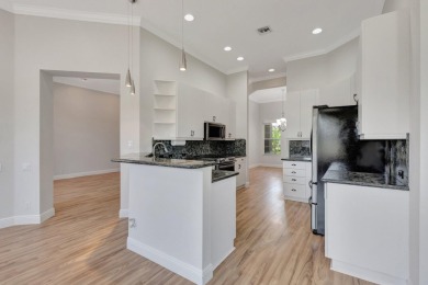 This unique lake-lateral home offers serene water views from the on Aberdeen Golf and Country Club in Florida - for sale on GolfHomes.com, golf home, golf lot