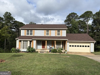 This beautifully updated home is located in a private gated on Canongate At Healy Point Country Club in Georgia - for sale on GolfHomes.com, golf home, golf lot