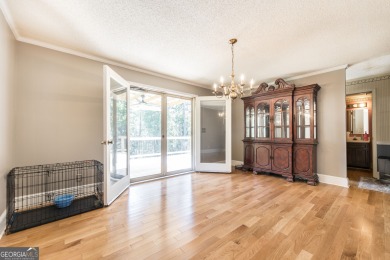 This beautifully updated home is located in a private gated on Canongate At Healy Point Country Club in Georgia - for sale on GolfHomes.com, golf home, golf lot