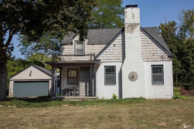 Charming Grosse Ile home situated walking distance to the water on West Shore Golf and Country Club in Michigan - for sale on GolfHomes.com, golf home, golf lot