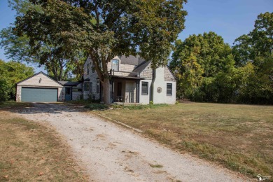Charming Grosse Ile home situated walking distance to the water on West Shore Golf and Country Club in Michigan - for sale on GolfHomes.com, golf home, golf lot
