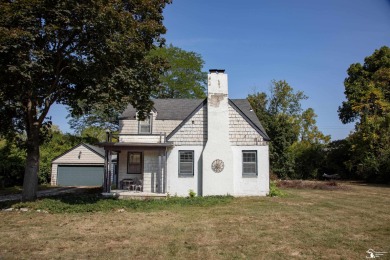 Charming Grosse Ile home situated walking distance to the water on West Shore Golf and Country Club in Michigan - for sale on GolfHomes.com, golf home, golf lot