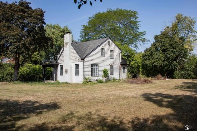 Charming Grosse Ile home situated walking distance to the water on West Shore Golf and Country Club in Michigan - for sale on GolfHomes.com, golf home, golf lot