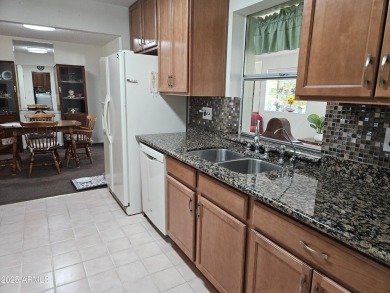 Discover carefree living in this partially furnished ''300 on Sunland Village Golf Club in Arizona - for sale on GolfHomes.com, golf home, golf lot