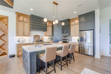 This home blends comfort, elegance, and function in one of on Heritage Park Golf Course in Kansas - for sale on GolfHomes.com, golf home, golf lot