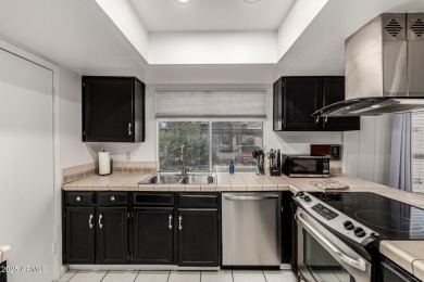 This charming two-story home awaits you in the desirable Bellair on Bellaire Golf Club in Arizona - for sale on GolfHomes.com, golf home, golf lot