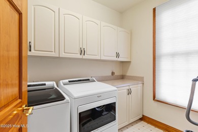 This custom 4-bedroom, 2.5-bath brick home is a true gem on Brunswick Plantation and Golf Resorts in North Carolina - for sale on GolfHomes.com, golf home, golf lot