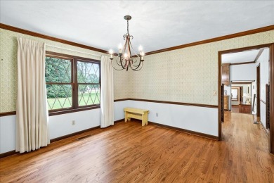 Incredible Tudor-style home on a full acre overlooking the newly on Killearn Country Club and Inn in Florida - for sale on GolfHomes.com, golf home, golf lot