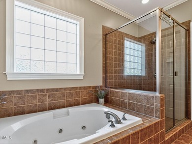 Custom-built home overlooking the 6th tee of Riverwood Golf on Riverwood Golf and Athletic Club in North Carolina - for sale on GolfHomes.com, golf home, golf lot