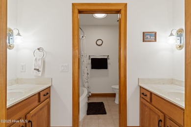 This custom 4-bedroom, 2.5-bath brick home is a true gem on Brunswick Plantation and Golf Resorts in North Carolina - for sale on GolfHomes.com, golf home, golf lot