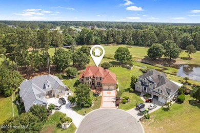 This custom 4-bedroom, 2.5-bath brick home is a true gem on Brunswick Plantation and Golf Resorts in North Carolina - for sale on GolfHomes.com, golf home, golf lot