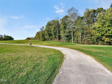 Custom-built home overlooking the 6th tee of Riverwood Golf on Riverwood Golf and Athletic Club in North Carolina - for sale on GolfHomes.com, golf home, golf lot