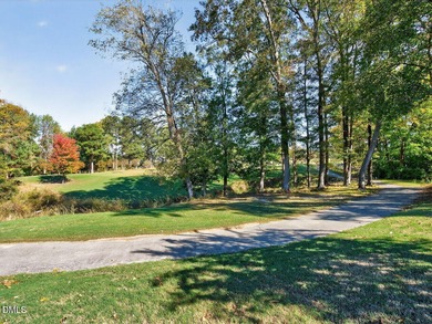 Custom-built home overlooking the 6th tee of Riverwood Golf on Riverwood Golf and Athletic Club in North Carolina - for sale on GolfHomes.com, golf home, golf lot