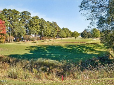 Custom-built home overlooking the 6th tee of Riverwood Golf on Riverwood Golf and Athletic Club in North Carolina - for sale on GolfHomes.com, golf home, golf lot