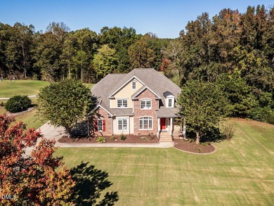 Custom-built home overlooking the 6th tee of Riverwood Golf on Riverwood Golf and Athletic Club in North Carolina - for sale on GolfHomes.com, golf home, golf lot
