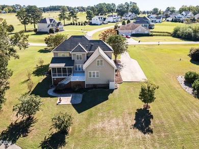 Custom-built home overlooking the 6th tee of Riverwood Golf on Riverwood Golf and Athletic Club in North Carolina - for sale on GolfHomes.com, golf home, golf lot