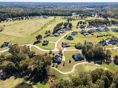 Custom-built home overlooking the 6th tee of Riverwood Golf on Riverwood Golf and Athletic Club in North Carolina - for sale on GolfHomes.com, golf home, golf lot