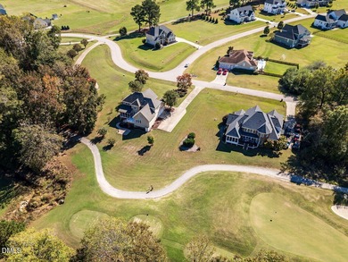 Custom-built home overlooking the 6th tee of Riverwood Golf on Riverwood Golf and Athletic Club in North Carolina - for sale on GolfHomes.com, golf home, golf lot