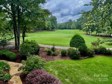 Nestled on the 6th green of The Old North State Club, 117 on Old North State Club at Uwharrie Point Golf community in North Carolina - for sale on GolfHomes.com, golf home, golf lot