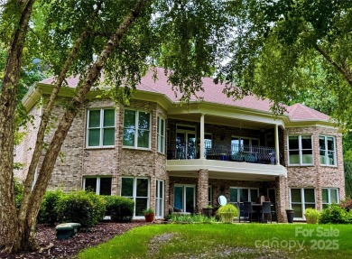 Nestled on the 6th green of The Old North State Club, 117 on Old North State Club at Uwharrie Point Golf community in North Carolina - for sale on GolfHomes.com, golf home, golf lot