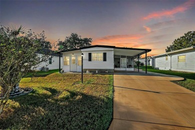 Welcome to this charming two-bedroom, one-bathroom home nestled on El Diablo Executive Golf Course in Florida - for sale on GolfHomes.com, golf home, golf lot